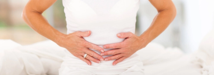 Chiropractic Greenwich CT Woman With Stomach Pain